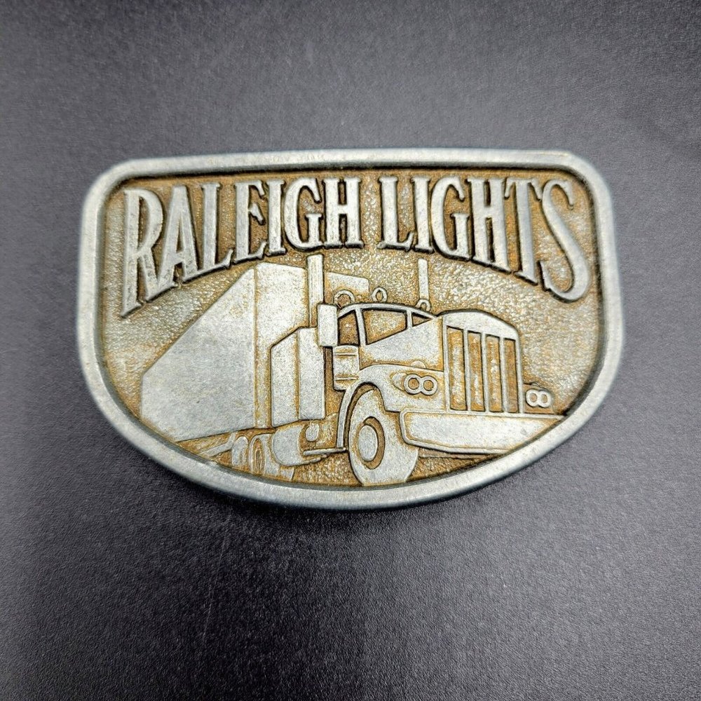Vintage Raleigh Lights Metal Men's Belt Buckle  3"x2" 18W Truck
